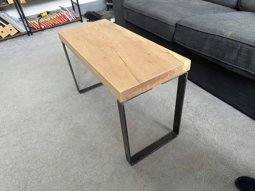 picture of coffee table with wooden top and metal legs